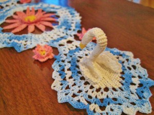 crocheted swan doily, crocheted lilies