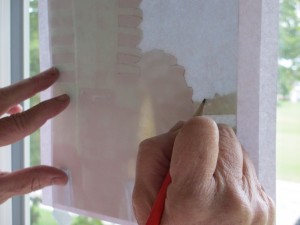 Tracing a picture, window pane, tracing, pencil sketch, tracing a tractor, antique tractor, artist hands,